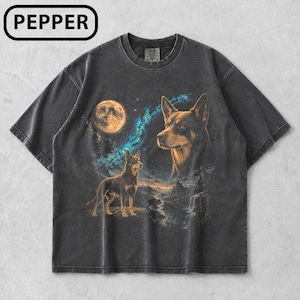 May include: A charcoal grey short-sleeve t-shirt featuring the text PEPPER in a white box at the top left. The graphic depicts two dogs in a night landscape with a full moon, a blue nebula, and a mountain scene with a flowing river and waterfall.