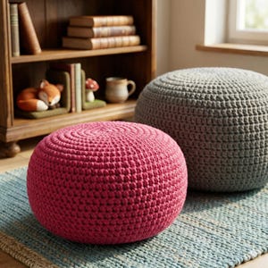 May include: A set of three ceramic mugs with a speckled, matte finish. The mugs are in shades of cream, light grey, and dark grey. Each mug has a simple, minimalist design, ideal for coffee or tea.