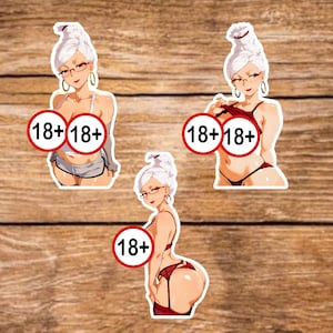 May include: Three stickers featuring anime-style illustrations of a woman with white hair, glasses, and lingerie. Each sticker has a red circle with the text "18+" or "18+18+". The stickers are on a wooden surface.