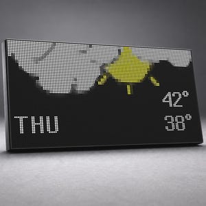 Könnte beinhalten: Ein rechteckiges digitales Wetterdisplay mit schwarzem Rahmen und Punktmatrix-Bildschirm. Der Bildschirm zeigt ein gelbes Sonnensymbol, weiße Wolkengrafiken, den Text THU sowie zwei Temperaturwerte von 42 Grad und 38 Grad in weißen Pixeln.