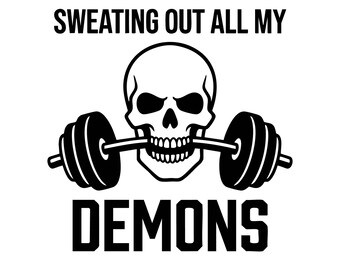 May include: A black and white graphic design featuring a human skull biting down on a barbell. The text SWEATING OUT ALL MY DEMONS is printed in a bold, sans-serif font, with the first line above the skull and the word DEMONS below the barbell.