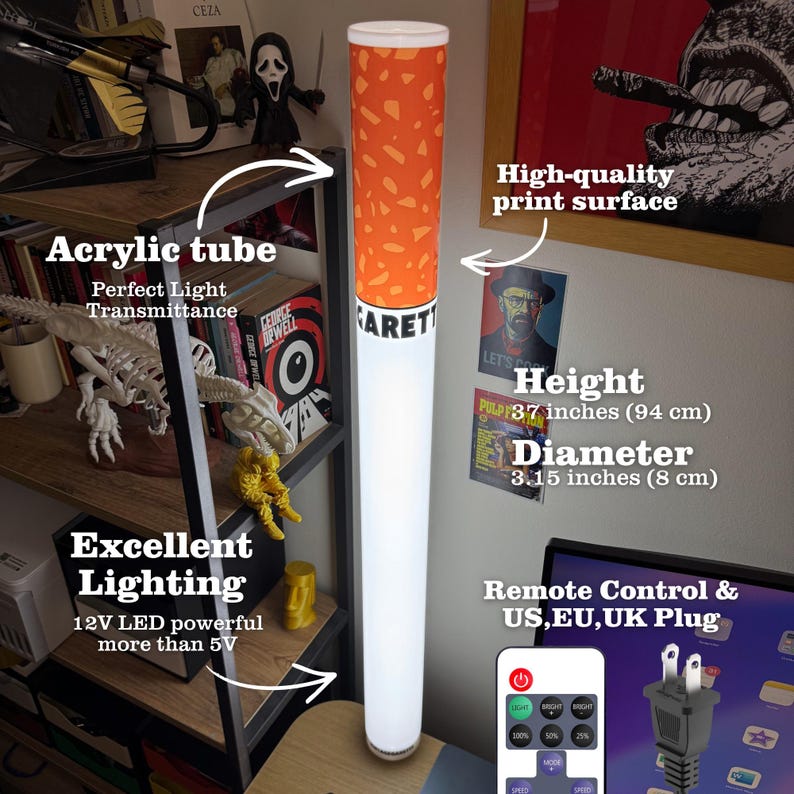 May include: A cylindrical floor lamp shaped like a cigarette with an orange filter section and a white body. The lamp stands 94 cm tall with an 8 cm diameter. It features an acrylic tube, 12V LED lighting, a remote control, and a UK plug.