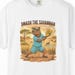 Smash the Savannah Capybara Pickleballer T-Shirt | Animal Sports Graphic Tee image 1