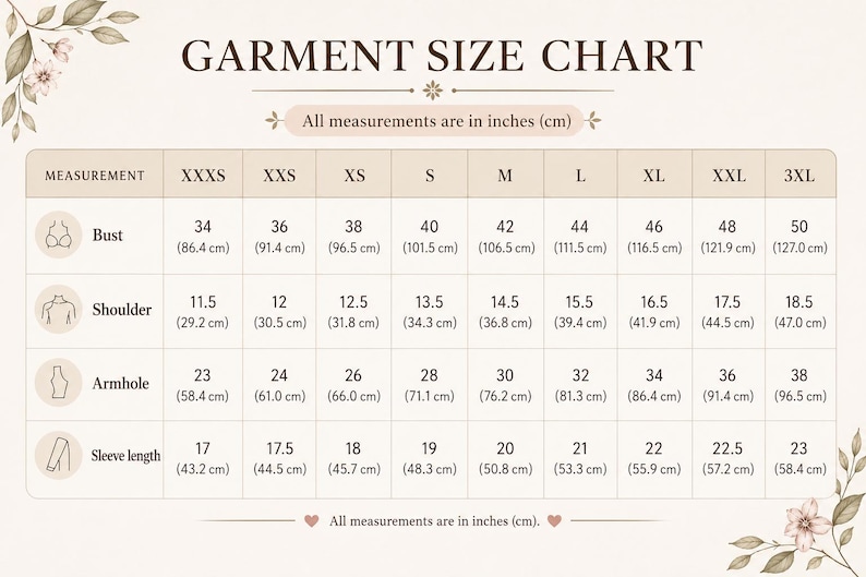 May include: A beige garment size chart with brown text and floral accents. The table lists measurements for bust, shoulder, armhole, and sleeve length in inches and centimeters for sizes ranging from XXXS to 3XL, with icons for each category.