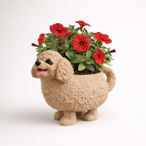 May include: A tan-colored dog-shaped planter with a textured surface, holding vibrant red petunia flowers. The dog planter has black eyes and a pink tongue, adding a playful touch to the garden decor. The planter is designed to hold plants and flowers.