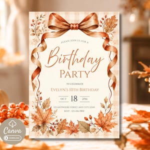 May include: A rectangular birthday party invitation card featuring a watercolour illustration of a large brown ribbon bow at the top, autumn maple leaves, and berries. The text reads: Please join us for a Birthday Party to celebrate Evelyn's 10th Birthday, Oct 18 2pm, 123 Anywhere Street, Any City, 12345, RSVP: 123-456-7890.