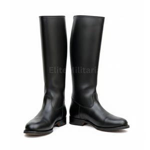 May include: A pair of black leather riding boots. The boots are tall, reaching the knee, with a smooth, polished finish. The soles are flat and the heels are low. The text "Elite Militari" is visible on the image.