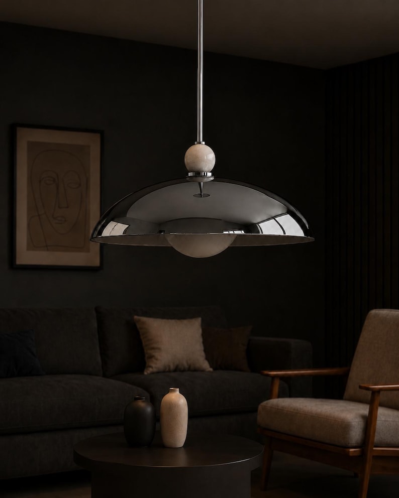 Retro futuristic chrome pendant lamp with oversized metallic dome and elegant alabaster detail for luxury interiors
Contemporary chrome hanging pendant fixture with wide dome shade, modern designer lighting for dining room and kitchen spaces
Modern chrome ceiling pendant light with alabaster sphere detail, contemporary dome hanging fixture for dining room lighting
Mid Century Modern Chrome Pendant Light, Luxury Dome Hanging Lamp, Alabaster Ball Ceiling Light, Modern Kitchen Island Lighting