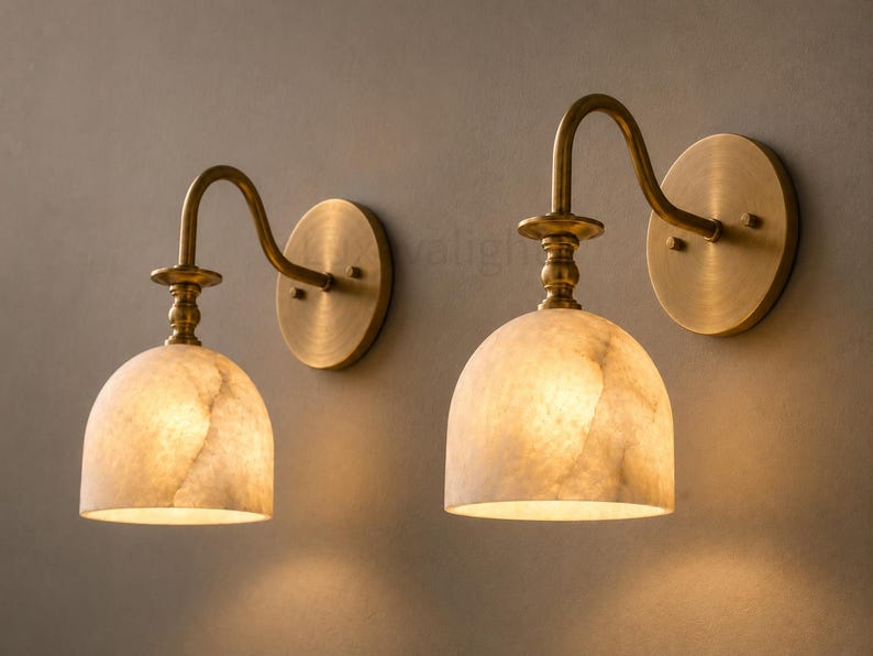 Modern brass wall light fixture with natural alabaster shade, handmade bathroom vanity sconce pair
Luxury alabaster bathroom wall sconces in antique brass, handcrafted mid century wall lighting
Natural alabaster wall sconce pair with antique brass finish, elegant modern bathroom vanity lights
Handcrafted brass and alabaster wall sconces, luxury mid century bathroom wall light fixtures
Modern bathroom vanity wall lights with alabaster shades antique brass finish, handmade brass wall sconce pair
