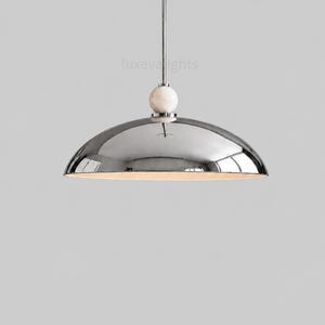 Mid Century Modern Dome Pendant Light, Italian Modern Hanging Lamp, Luxury Chrome Pendant Lighting, Alabaster Ball Ceiling Light, Minimalist Kitchen Island Fixture
1950s Mid Century Modern Dome Pendant Light, Italian Modern Hanging Lamp, Luxury Chrome Ceiling Light, Minimalist Kitchen Island Fixture
Mid century modern chrome dome pendant light with alabaster ball detail, luxury Italian modern hanging lamp for kitchen island or dining room
modern designer lighting for dining room kitchen spaces