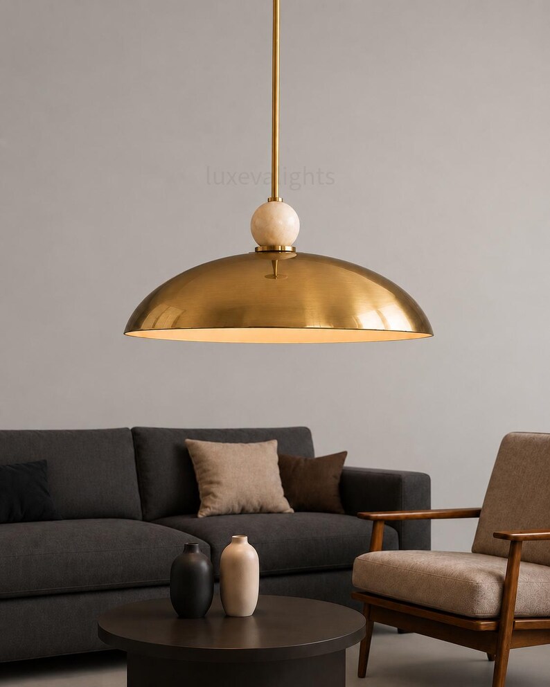 Minimalist chrome dome pendant lamp inspired by vintage Italian modern design, elegant ceiling light for modern home decor
Handmade chrome dome hanging light with warm ambient glow, mid century modern kitchen island lighting fixture
Large polished chrome pendant light with sleek dome shade and alabaster ball accent, luxury modern ceiling fixture
Scandinavian modern chrome dome ceiling light with minimalist hanging rod and soft warm interior lighting aesthetic
Retro futuristic chrome pendant lamp