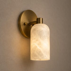 Pair of modern natural alabaster wall sconces in solid antique brass, luxury mid century wall lights for bathroom vanity, bedroom bedside, hallway and living room
Modern antique brass alabaster wall sconce pair with warm lighting for luxury bathroom vanity and bedroom decor
Handmade solid antique brass wall sconces with natural alabaster shades, modern mid century wall lighting
Luxury natural alabaster wall light pair in antique brass finish for bathroom vanity, bedside and hallway lighting