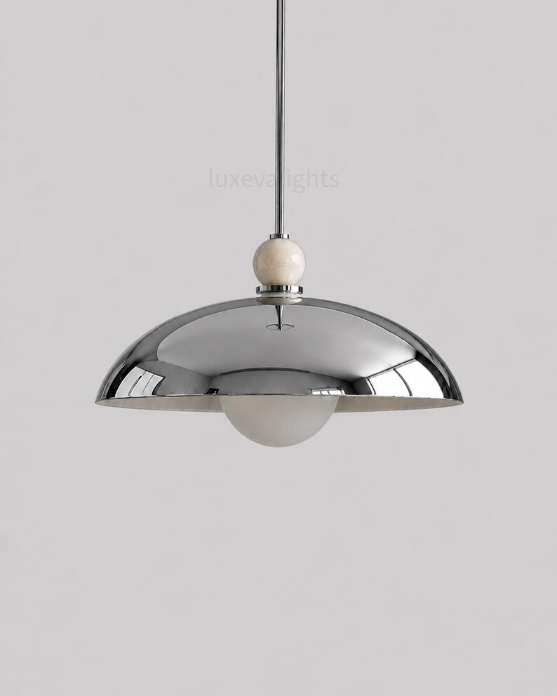 Mid Century Modern Chrome Dome Pendant Light, Italian Modern Hanging Lamp, Luxury Kitchen Island Lighting, Alabaster Ball Ceiling Fixture
Luxury chrome dome pendant lighting fixture in 1950s mid century modern style with natural alabaster accent and minimalist design
Italian modern chrome hanging lamp with large metallic dome shade, minimalist kitchen island pendant light for luxury interiors
Modern chrome ceiling pendant light with alabaster sphere detail, contemporary dome hanging fixture