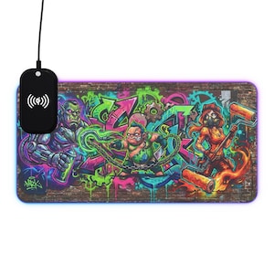 May include: A rectangular mouse pad with a vibrant graffiti design featuring cartoon characters and colorful spray paint art. The pad includes a wireless charging base with a black finish and a glowing edge.