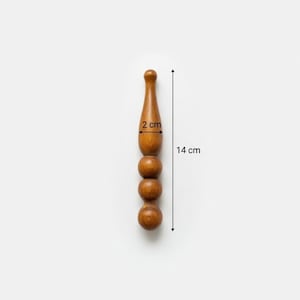 May include: A wooden massage tool, 14 cm long, with a rounded handle and three spherical massage heads. The tool is a warm brown color and is 2 cm wide at its widest point. The tool is designed for massage and muscle relief.