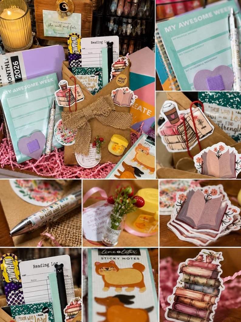 May include: A collection of stationery items, including notebooks, pens, stickers, and bookmarks. The items are decorated with floral and book-themed designs, and the text "be still and know" is visible on a pen. The items are arranged in a gift box.