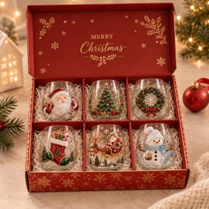 May include: A red gift box with the text Merry Christmas containing six clear glass tumblers. Each glass features a distinct holiday design: a Santa Claus, a Christmas tree, a wreath, a stocking, a Santa in a sleigh, and a snowman.