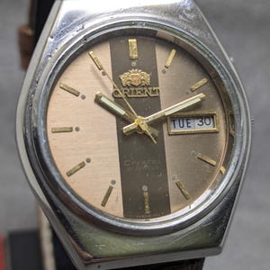vintage orient automatic day date movement no. 46943 Japan made men's watch.