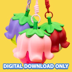 以下が含まれることがあります： 紫、ピンク、赤のベル型チャーム3つ。それぞれ緑の茎が付いており、カラフルな紐で吊り下げられています。チャームは質感のある穴あきベースと、滑らかな花びらのような外観が特徴です。下部には「DIGITAL DOWNLOAD ONLY」というテキストが表示されています。