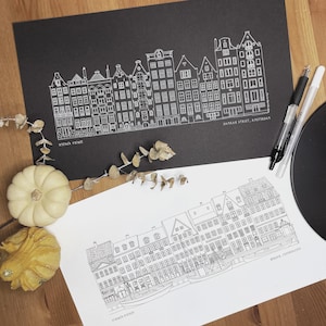 Puede incluir: Un juego de tres tazas de cerámica con un acabado mate moteado. Las tazas son en tonos crema, gris claro y gris oscuro. Cada taza tiene un diseño simple y minimalista y un asa redondeada.
