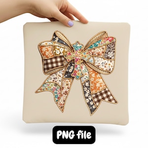 May include: A beige square pillow featuring a large, colorful bow design. The bow is composed of various floral and checkered fabric patches, with a cross-shaped embellishment at the center. The text "PNG file" is displayed on a black rectangle at the bottom.
