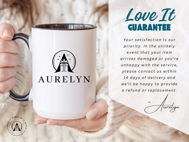K&ouml;nnte beinhalten: Ein wei&szlig;er Keramikbecher mit dunklem Innenraum und Henkel, der ein schwarzes Logo eines Geschenkkartons in einem Kreis mit dem Text AURELYN zeigt. Rechts steht der Text Love It GUARANTEE, gefolgt von einer Richtlinie f&uuml;r besch&auml;digte Artikel.