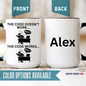May include: A white ceramic mug with a black handle and rim. The front features a black graphic of a person at a desk with the text THE CODE DOESN'T WORK... WHY? and THE CODE WORKS... WHY? The back displays the name Alex in black text.