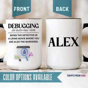 May include: A white ceramic mug with a black handle and rim. The front features the text DEBUGGING /DE-BUGH-ING/ -VERB followed by a definition and a graphic of a magnifying glass over a bug. The back of the mug displays the name ALEX in black.