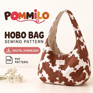 Puede incluir: Un bolso hobo con estampado de manchas de vaca en marrón y blanco, con una sola correa para el hombro y una pequeña etiqueta rectangular con el texto POMMILO y un símbolo de corazón. La imagen incluye el texto POMMILO HOBO BAG SEWING PATTERN.