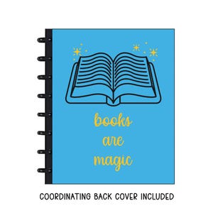 May include: A blue notebook with a black spiral binding. The cover features a black line drawing of an open book with yellow stars and the words "books are magic" in yellow script. The text "COORDINATING BACK COVER INCLUDED" is at the bottom.