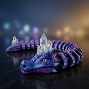 May include: A flexible, articulated dragon figurine featuring a gradient of deep blue and purple scales. The dragon has a prominent, iridescent crystal cluster on its head and a smaller one on its tail, with a single, detailed yellow eye visible.