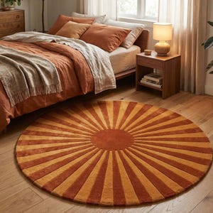 and indoor plant complement the cozy and elegant atmosphere. This round rug acts as a statement centerpiece, perfect for boho,