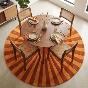 creative studio spaces. The symmetrical sunburst design adds visual interest and a luxurious handcrafted feel, appealing to