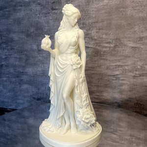 White Persephone statue front view with elegant flowing details, Greek mythology decor, feminine spiritual sculpture, and minimalist goddess figurine.