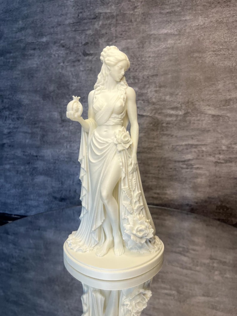 White Persephone statue front view with elegant flowing details, Greek mythology decor, feminine spiritual sculpture, and minimalist goddess figurine.