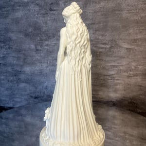 Back detail of Persephone altar statue with elegant sculpted textures, white PLA mythology figurine, spiritual and occult inspired decor.
Detailed Persephone sculpture close angle showing decoration