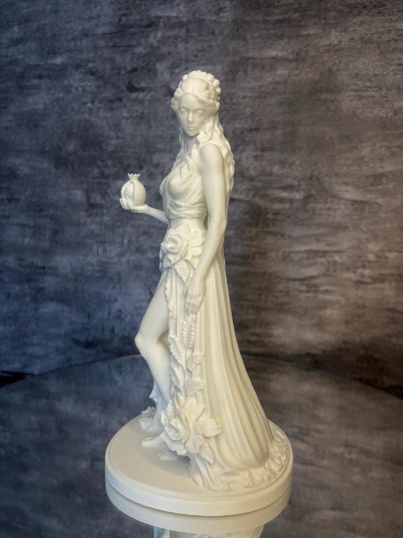 Persephone figurine side profile showing detailed drapery and graceful silhouette, decorative Greek goddess sculpture for mystical home decor.