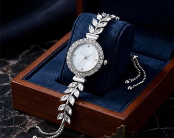 Reloj de pulsera redondo para mujer con diseño de hojas y detalles de diamantes, correa ajustable, esfera sencilla y diseño moderno. Regalo ideal.