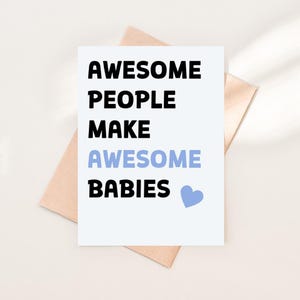 May include: A white card with the text "AWESOME PEOPLE MAKE AWESOME BABIES" in black and light blue, with a blue heart. The card is on a brown envelope.