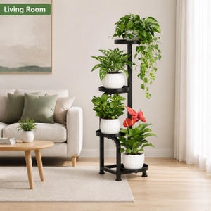 May include: A tall black metal plant stand with five circular tiers holding white ribbed pots. The plants include a trailing vine, a leafy green plant, and a plant with red flowers. A small white pot sits on a wooden coffee table nearby.