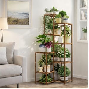 May include: A multi-tiered, wooden plant stand filled with various potted plants. The stand is a warm brown color and has a geometric design. The plants include a variety of green foliage and colorful flowers, creating a vibrant display.