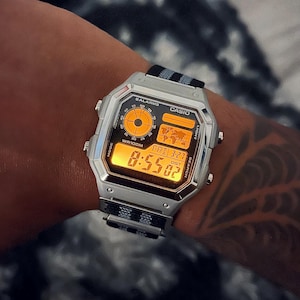 May include: A set of three ceramic nesting bowls in shades of blue, green, and white. The bowls feature a speckled glaze and a simple, modern design. The largest bowl is approximately 6 inches in diameter.