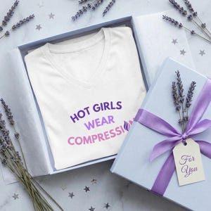 May include: A set of three ceramic mugs with a speckled, matte finish. The mugs are in shades of cream, light grey, and dark grey. Each mug has a simple, minimalist design, ideal for coffee or tea.