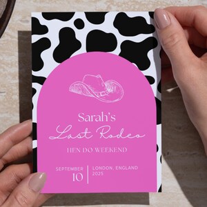 May include: A hen party invitation card with a black and white cow print design. The card has a pink section with a cowboy hat illustration and the text "Sarah's Last Rodeo Hen Do Weekend", with the date and location.
