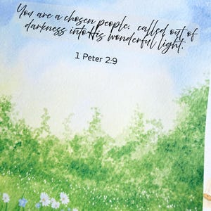 May include: A watercolor print featuring a field of white daisies and green foliage under a bright blue sky. The text reads: You are a chosen people, called out of darkness into His wonderful light. 1 Peter 2:9, printed in black script.