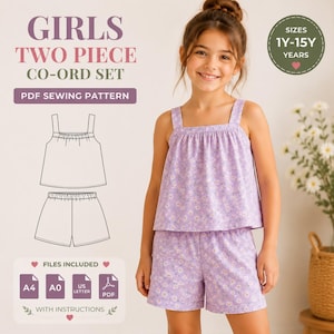 May include: A two-piece co-ord set PDF sewing pattern for a light purple floral tank top and shorts. The image displays the text GIRLS TWO PIECE CO-ORD SET PDF SEWING PATTERN, SIZES 1Y-15Y YEARS, and FILES INCLUDED A4, A0, US LETTER, PDF WITH INSTRUCTIONS.