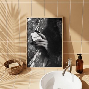 Editorial print; monochrome fashion photo art of hand with fur against marble wall for chic feminine bathroom wall art