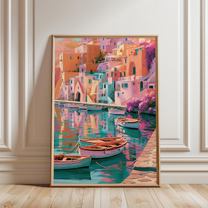 May include: A vertical wall art print depicting a coastal village with pastel-colored buildings in shades of peach, pink, and blue, situated along a harbor. Several small wooden rowboats float on the calm water, reflecting the vibrant architecture.
