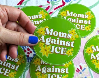 Moms Against Ice, round sticker with coreopsis