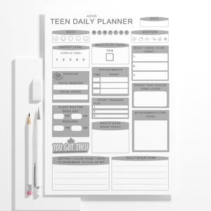 May include: A white ADHD Teen Daily Planner with gray text and boxes for mood, appointments, and tasks. Includes a pencil, eraser, and a pen. The planner has the text "YOU GOT THIS!"